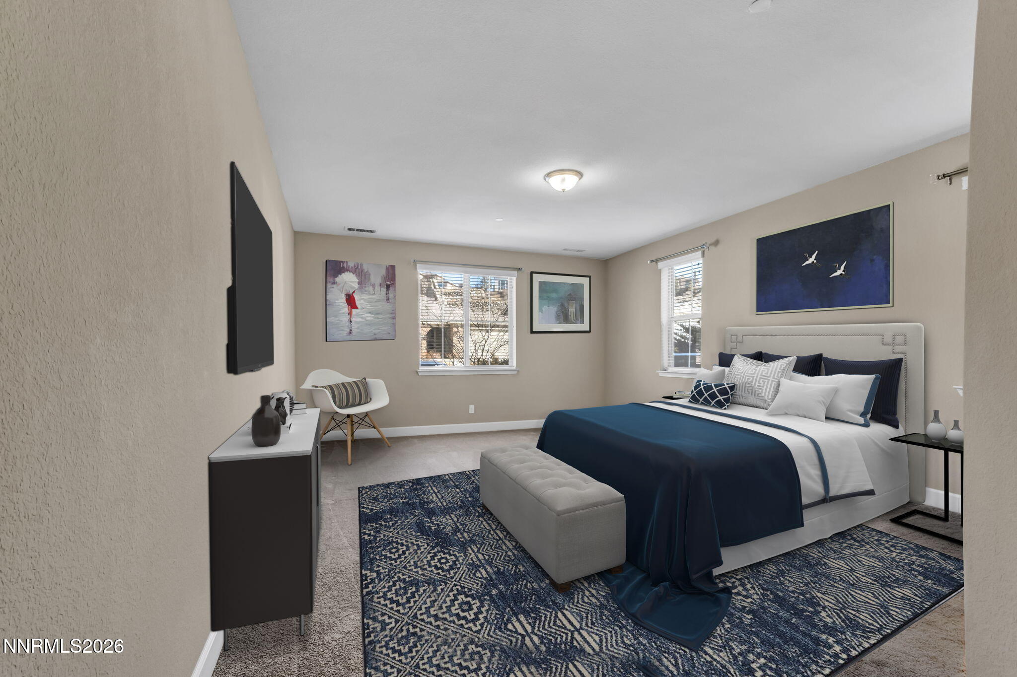 1725 Verdi Vista Court Reno, NV 89523 - Photo 19 of 19 a bedroom with a bed and a couch