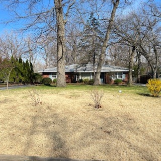 17915 Hood Avenue Homewood, IL 60430 - Photo 6 of 10 a view of house with large trees and yard