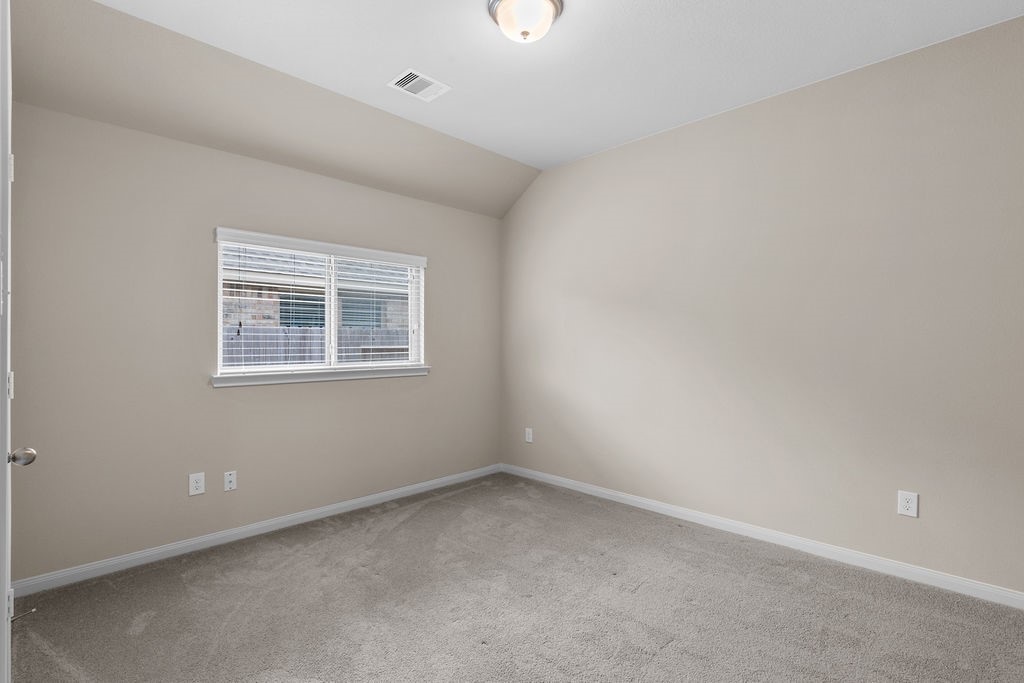 2666 Cedar Path Lane Conroe, TX 77385 - Photo 16 of 22 an empty room with windows