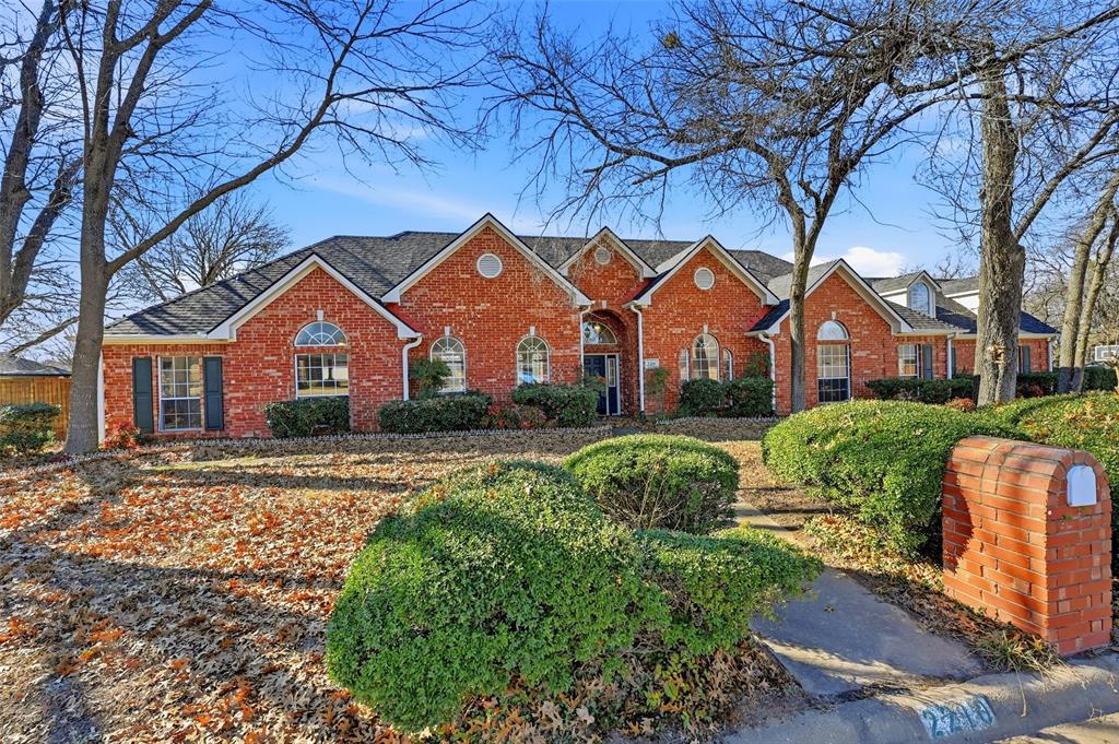 2210 Meadows Lane Sherman, TX 75092 - Photo 2 of 40 a front view of a house with a yard
