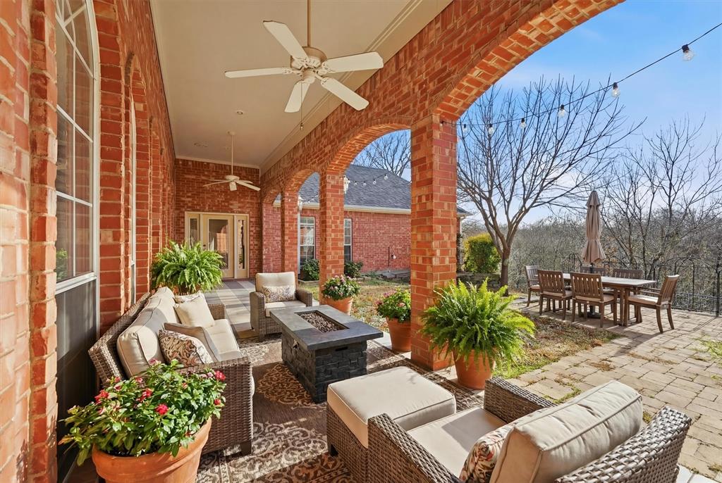 2210 Meadows Lane Sherman, TX 75092 - Photo 26 of 40 a building outdoor space with patio furniture