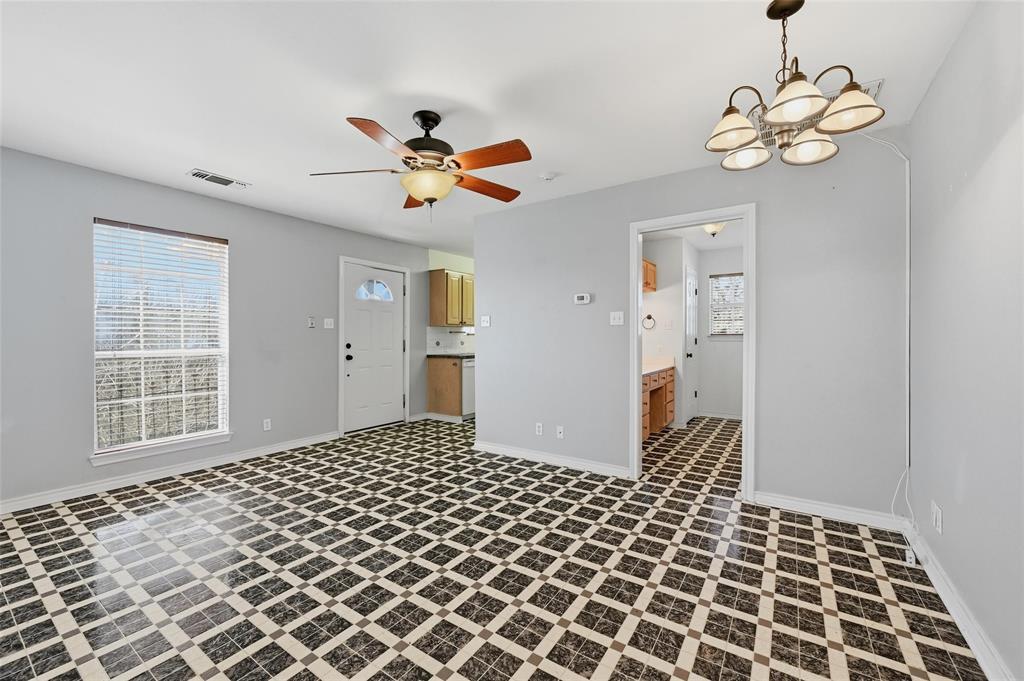 2210 Meadows Lane Sherman, TX 75092 - Photo 32 of 40 a bedroom with a bed and a window