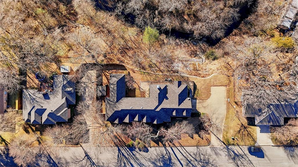 2210 Meadows Lane Sherman, TX 75092 - Photo 36 of 40 a view of balcony with two chairs and a table