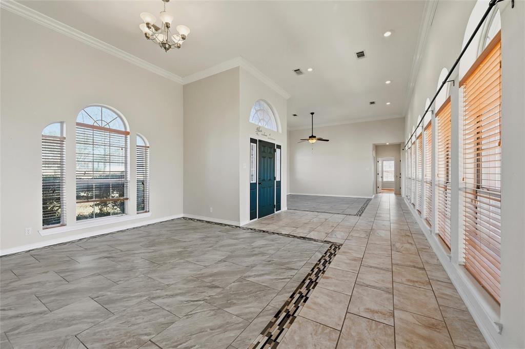 2210 Meadows Lane Sherman, TX 75092 - Photo 6 of 40 a view of an empty room with a window