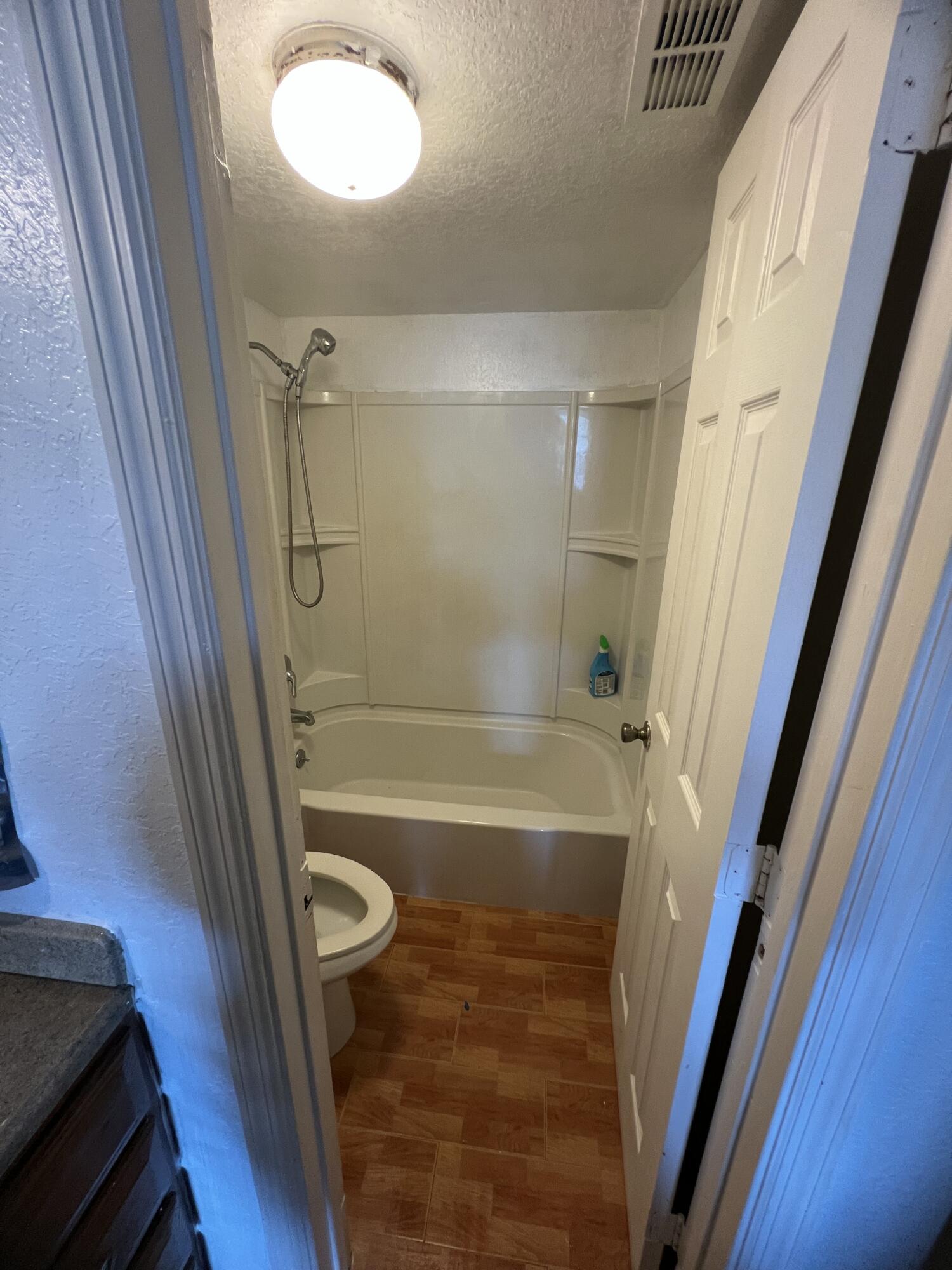 5500 Northwest 2nd Avenue, Unit 121 Boca Raton, FL 33487 - Photo 15 of 28 a bathroom with a tub and a shower