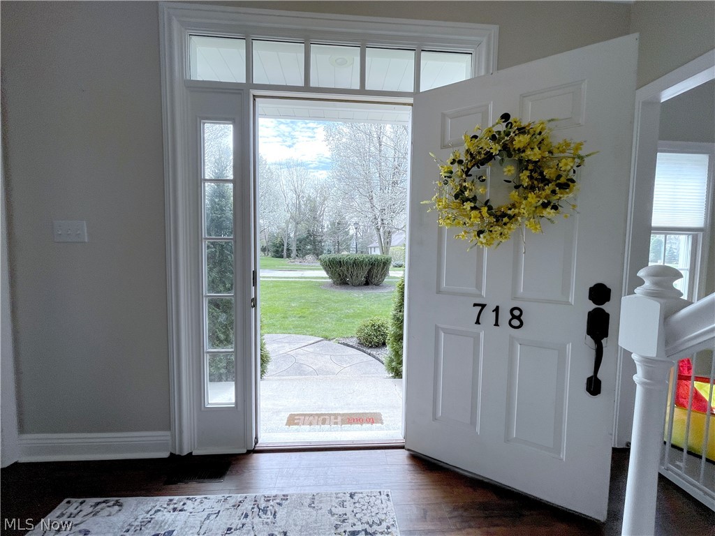 718 Sunridge Road Fairlawn, OH 44333 - Photo 2 of 49 Foyer entrance featuring dark hardwood / wood-style floors and a healthy amount of sunlight