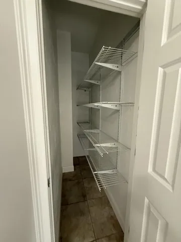 a room with storage and utility