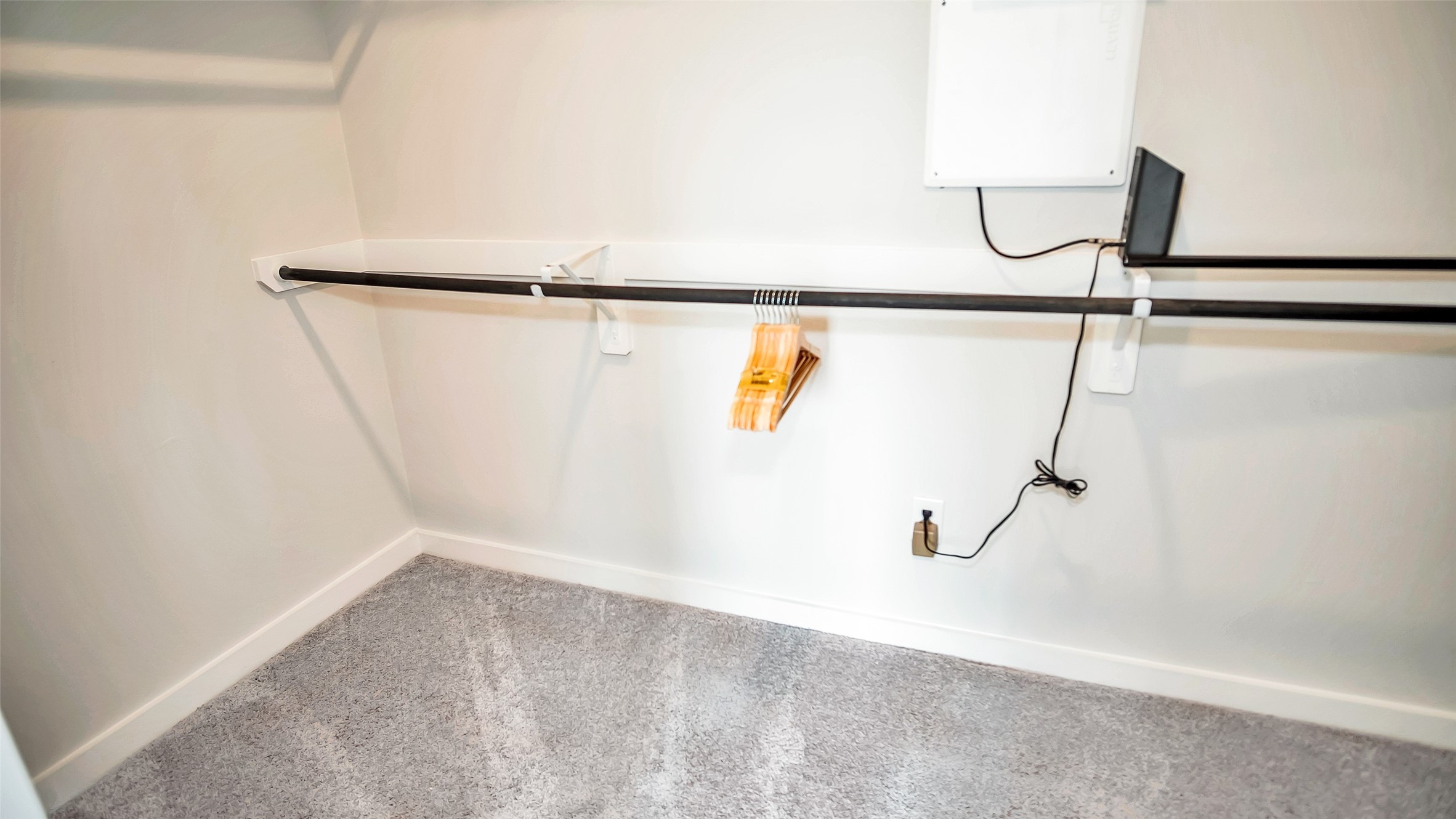 1919 Pueblo Nuevo Path Houston, TX 77077 - Photo 9 of 50 a view of small space with racks on the wall