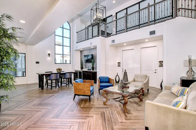 a dining room with wooden floor and breakfast area
