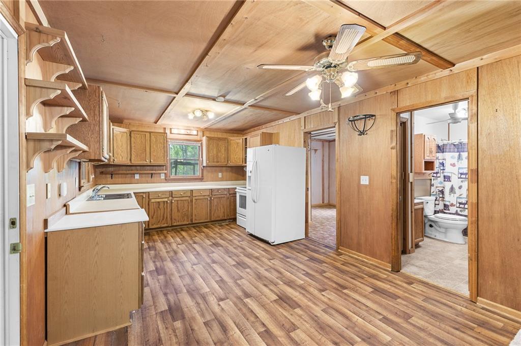 847 North Quail Trail Clarkesville, GA 30523 - Photo 5 of 40 a view of a storage & utility room with a fridge