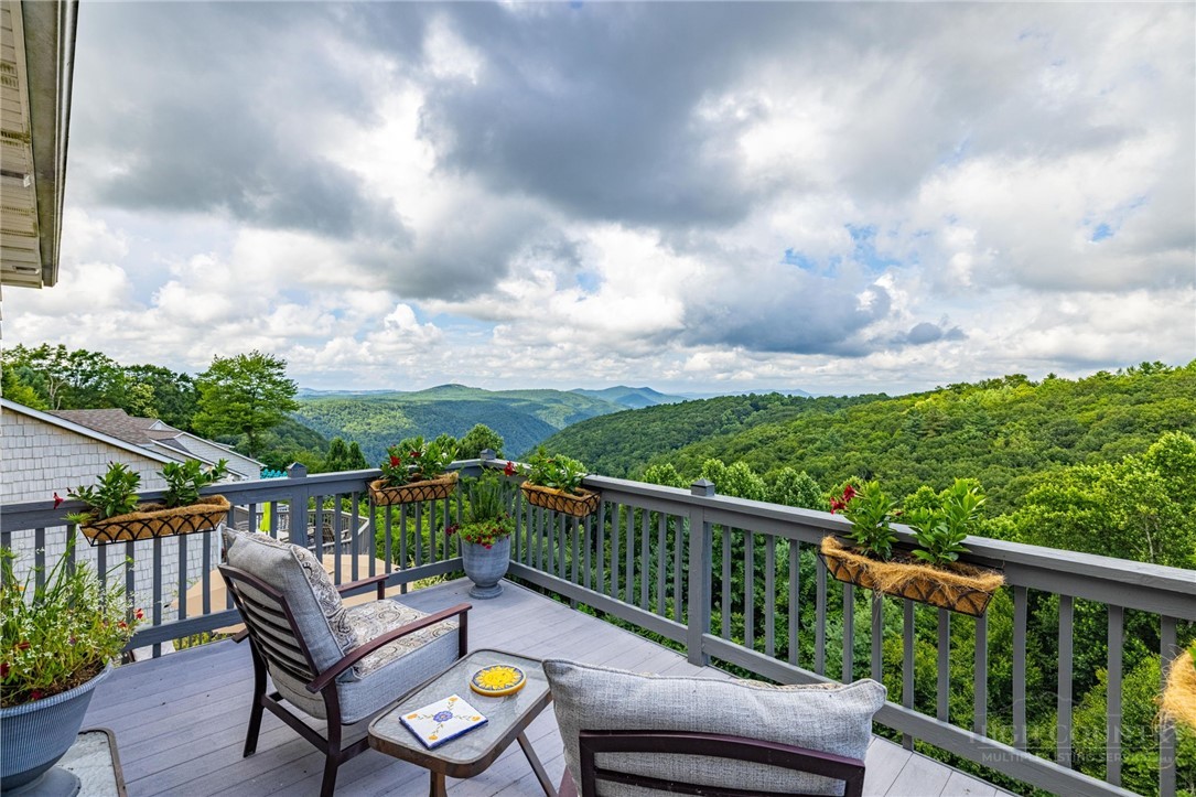 50 Mitchell River Ridge Thurmond, NC 28683 - Photo 21 of 43 a view of a two chair in the balcony