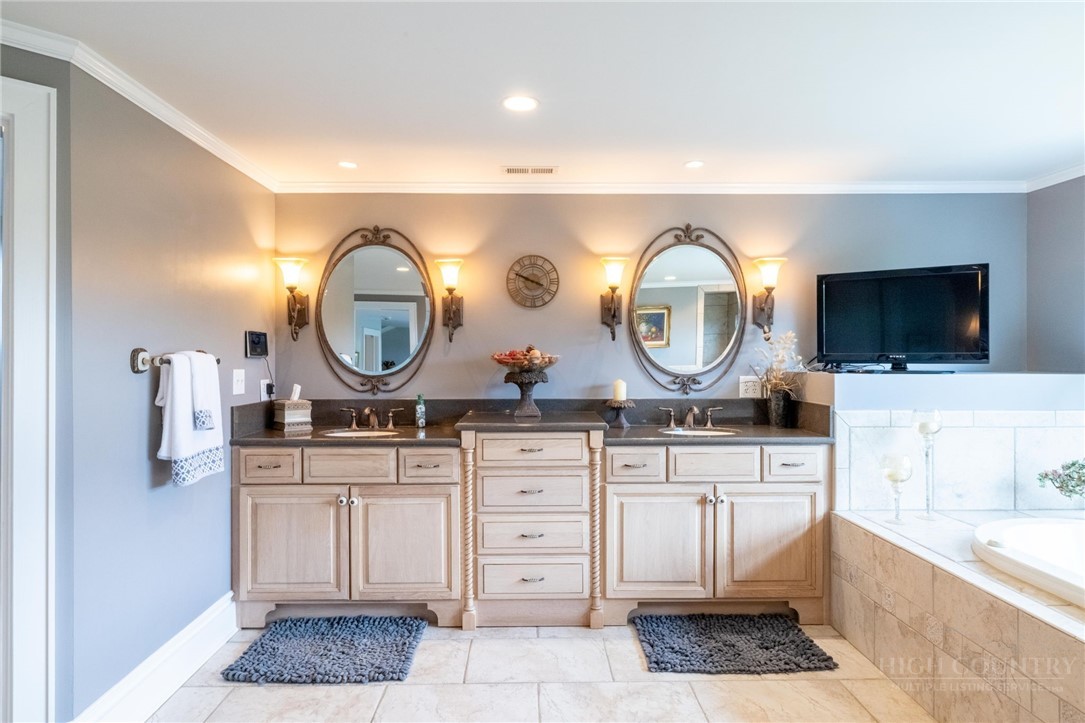 50 Mitchell River Ridge Thurmond, NC 28683 - Photo 28 of 43 a view with a sink and a mirror