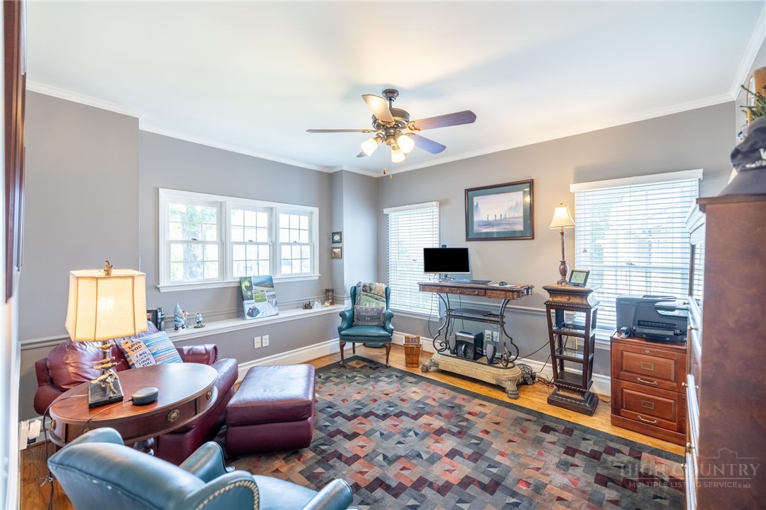 50 Mitchell River Ridge Thurmond, NC 28683 - Photo 8 of 43 a living room with furniture a flat screen tv and a large window