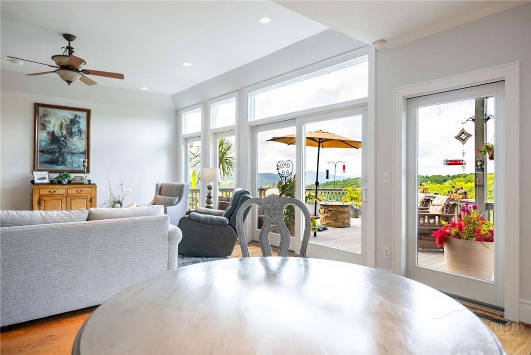 50 Mitchell River Ridge Thurmond, NC 28683 - Photo 9 of 43 a living room with furniture fireplace and a large window