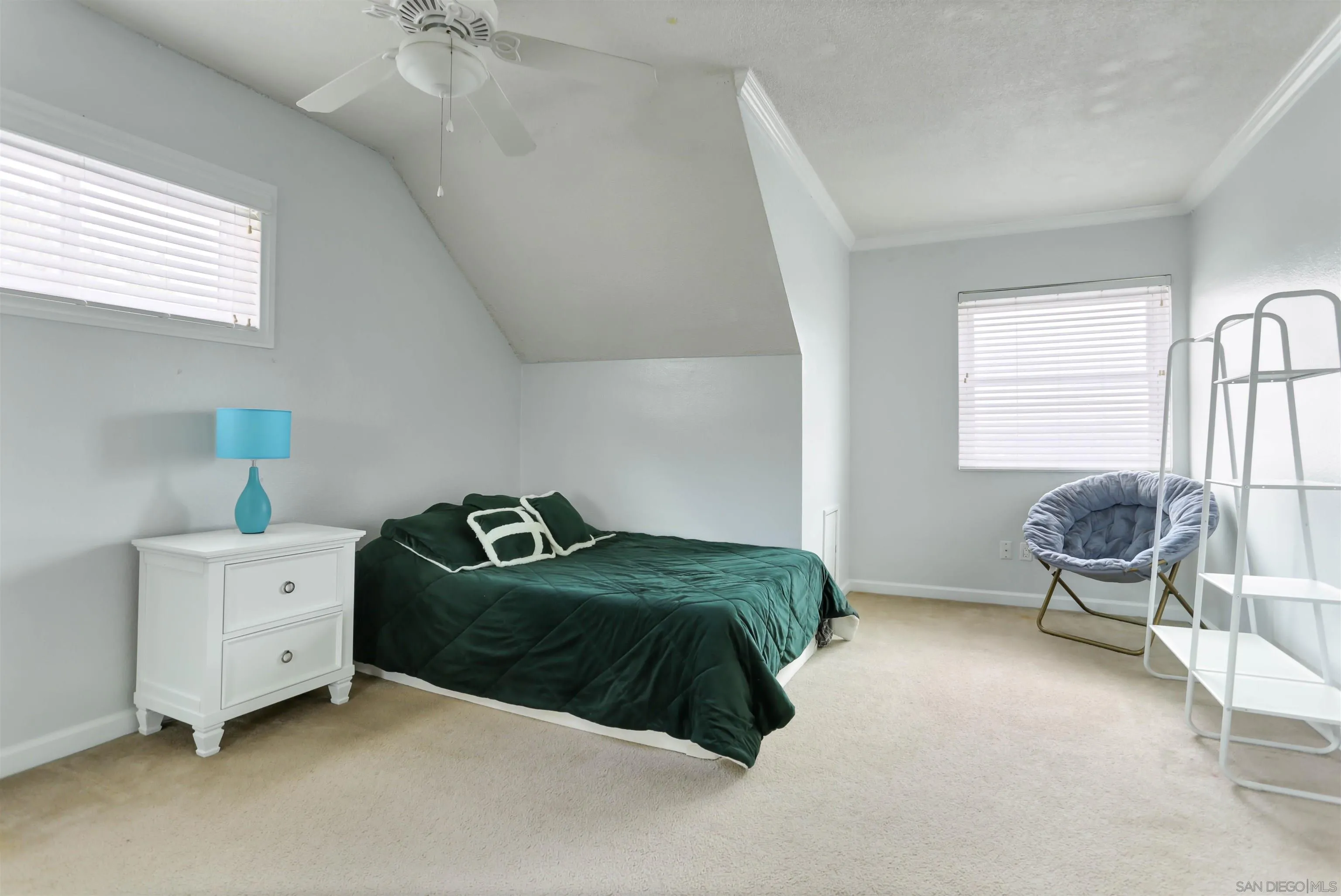 8009 Shantung Drive Santee, CA 92071 - Photo 18 of 39 a bedroom with a bed and window
