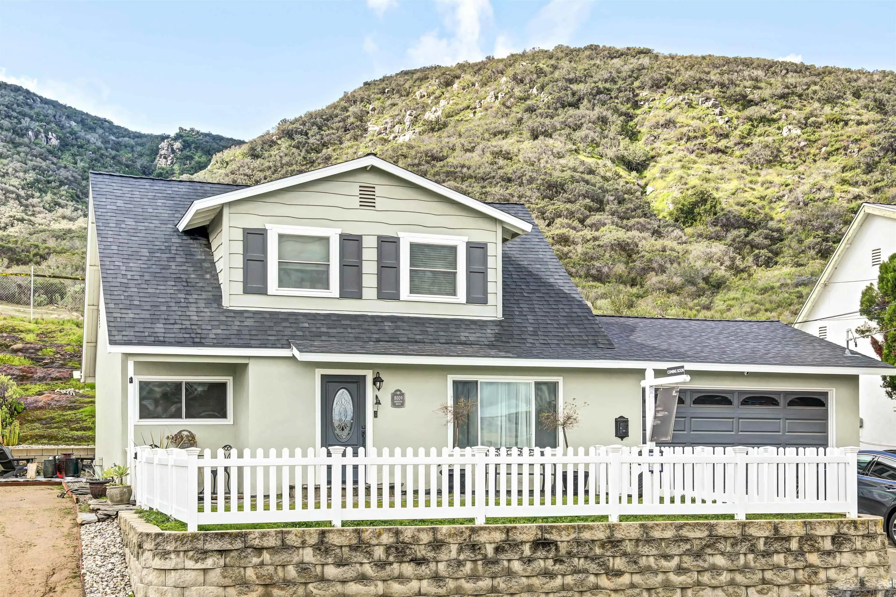 8009 Shantung Drive Santee, CA 92071 - Photo 2 of 39 a front view of a house with a yard