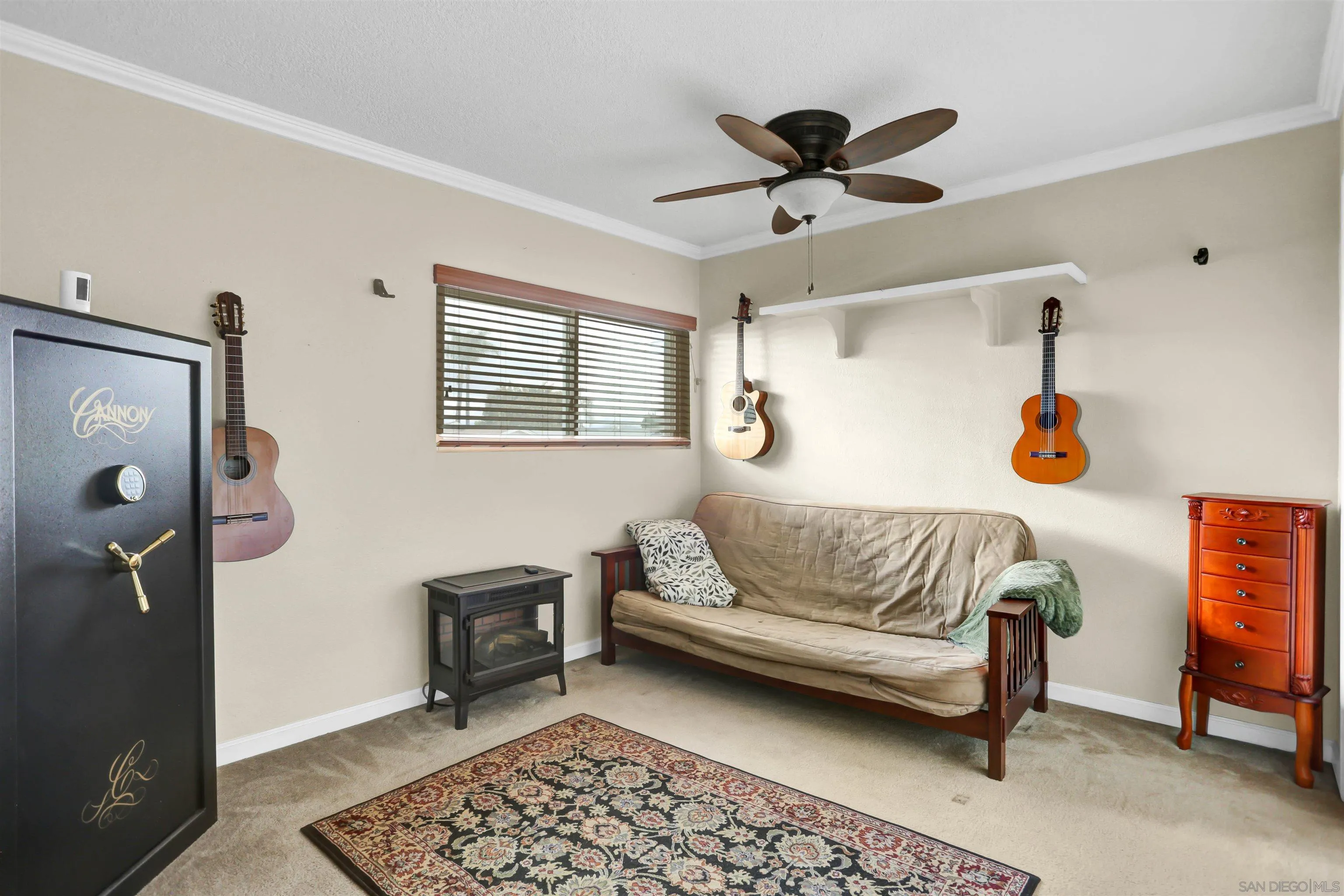 8009 Shantung Drive Santee, CA 92071 - Photo 21 of 39 a living room with furniture and a rug