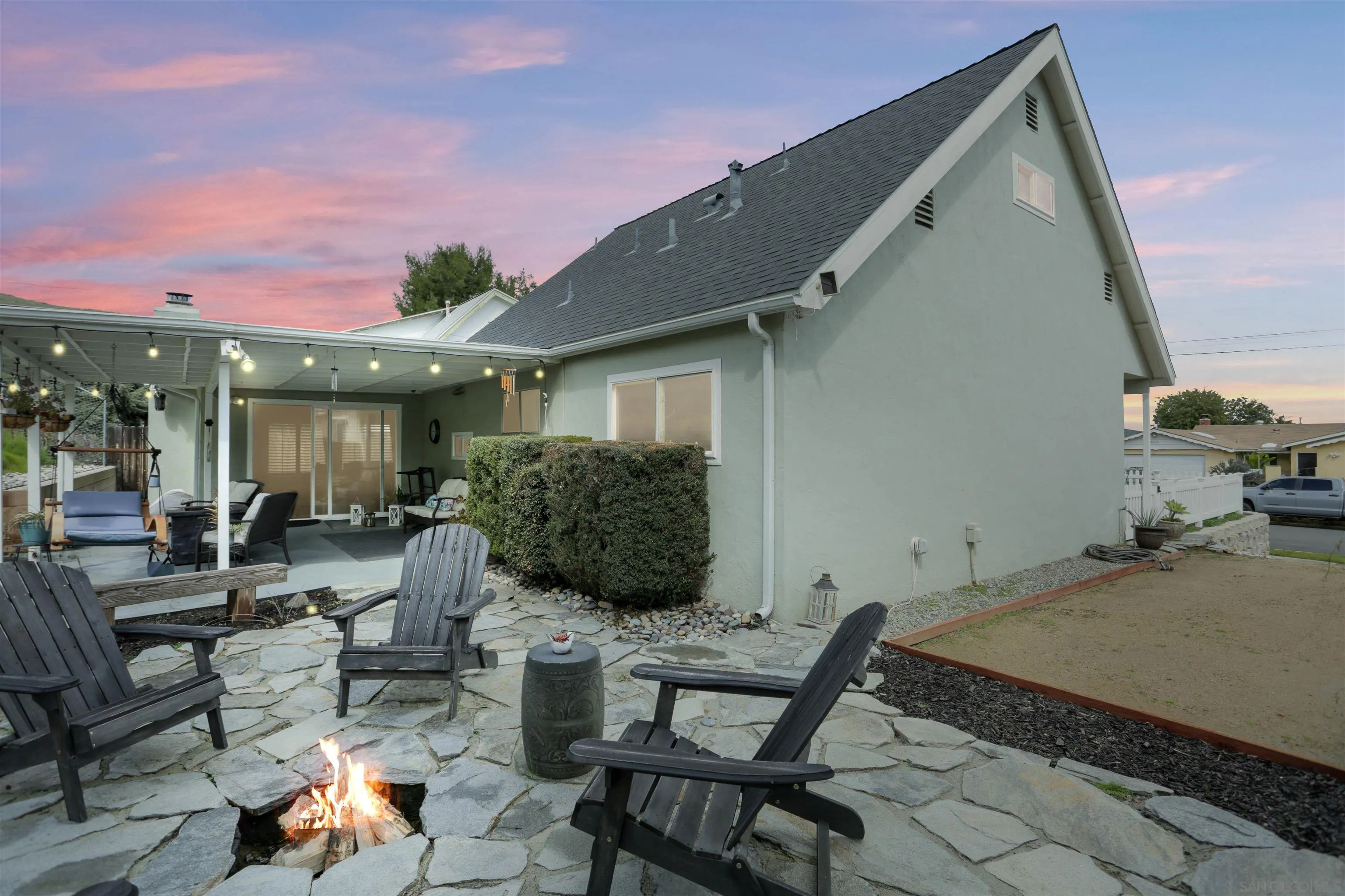 8009 Shantung Drive Santee, CA 92071 - Photo 25 of 39 a backyard of a house with outdoor seating