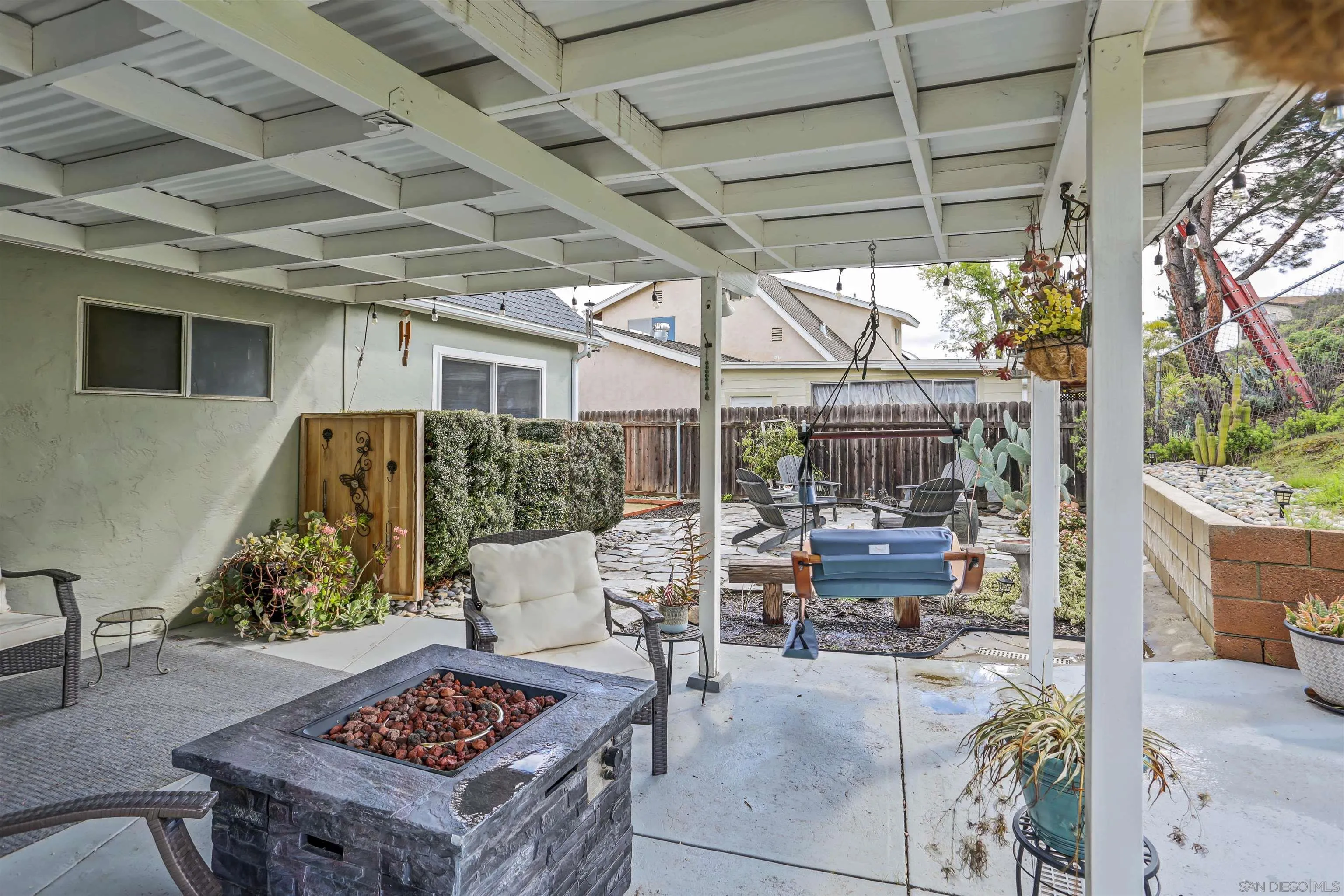 8009 Shantung Drive Santee, CA 92071 - Photo 28 of 39 a view of a chairs and table in a patio