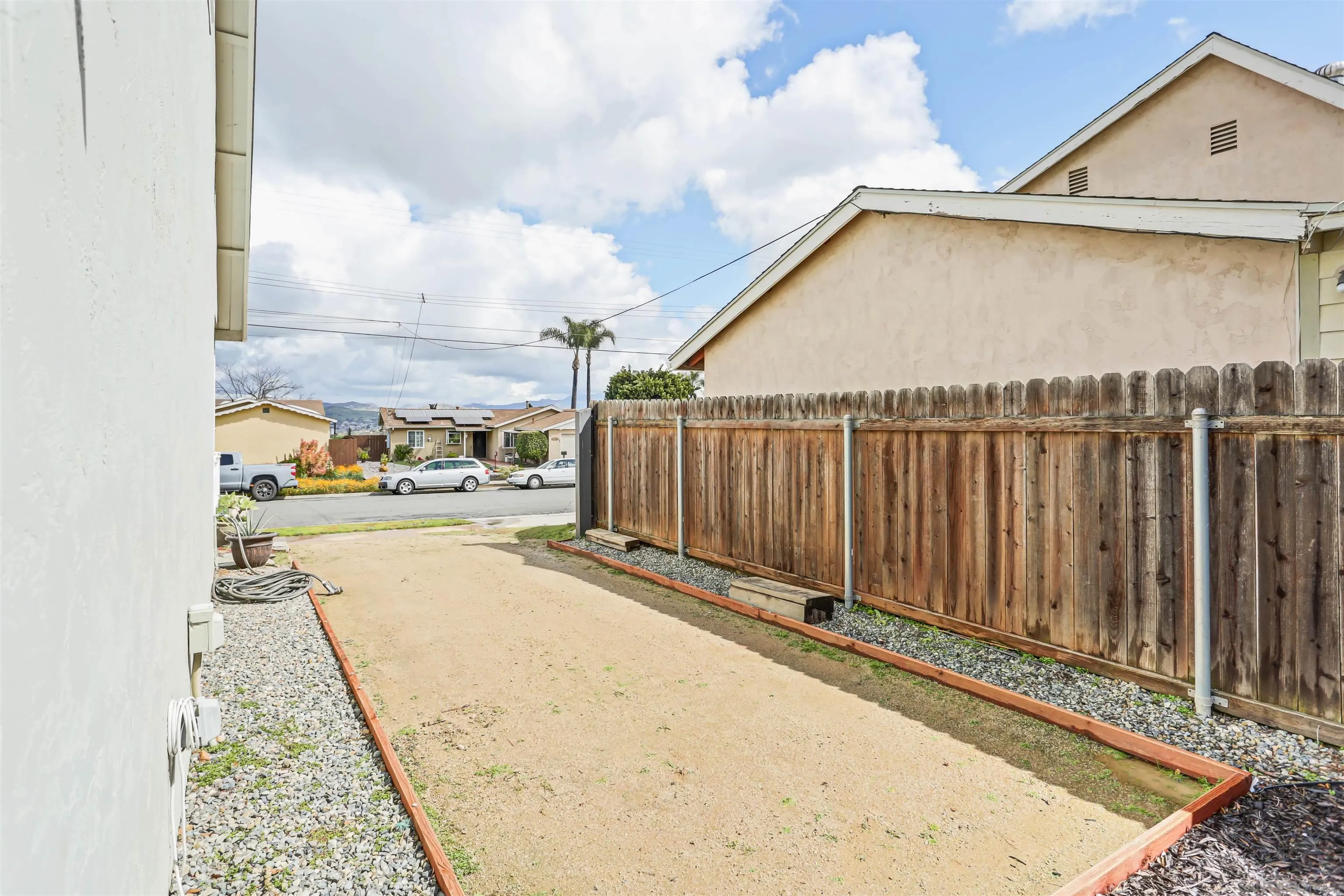 8009 Shantung Drive Santee, CA 92071 - Photo 31 of 39 a view of a terrace with wooden fence