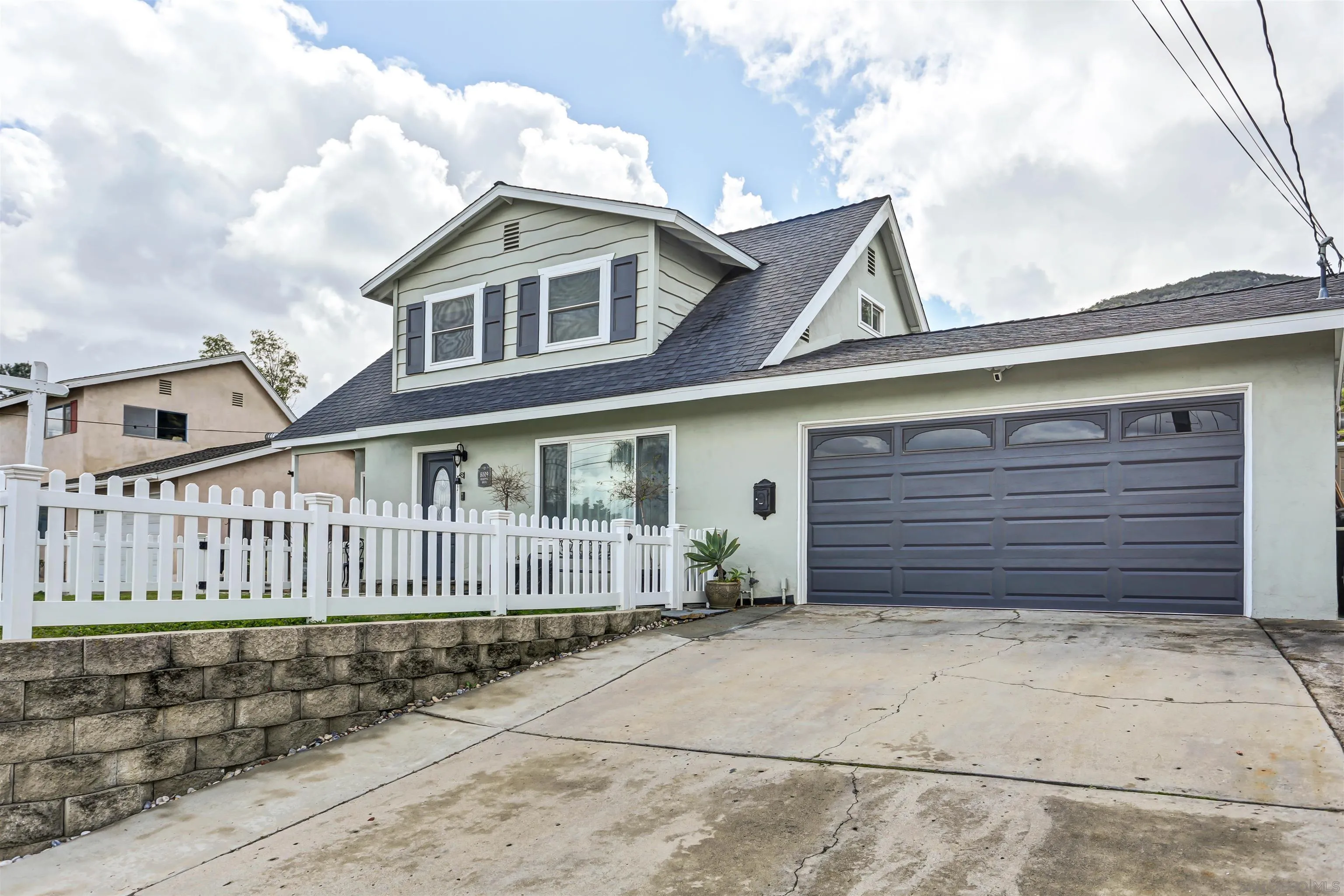8009 Shantung Drive Santee, CA 92071 - Photo 32 of 39 a front view of a house
