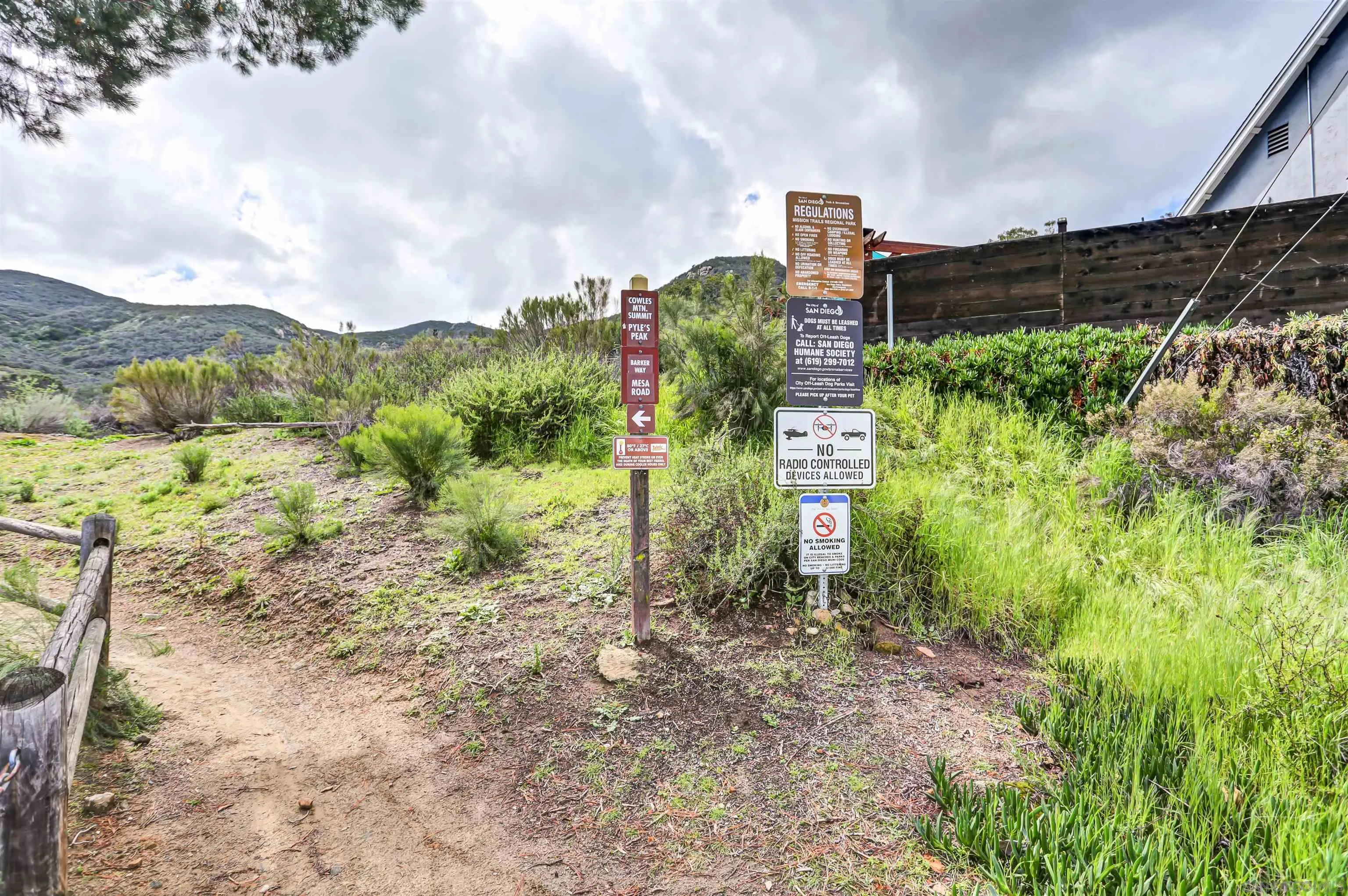8009 Shantung Drive Santee, CA 92071 - Photo 35 of 39 a view of a garden with an houses