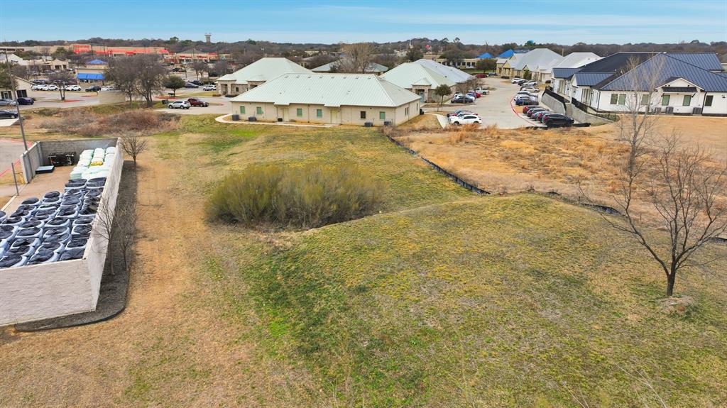 6130 Precinct Line Road Hurst, TX 76054 - Photo 3 of 8 an aerial view of residential houses with outdoor space