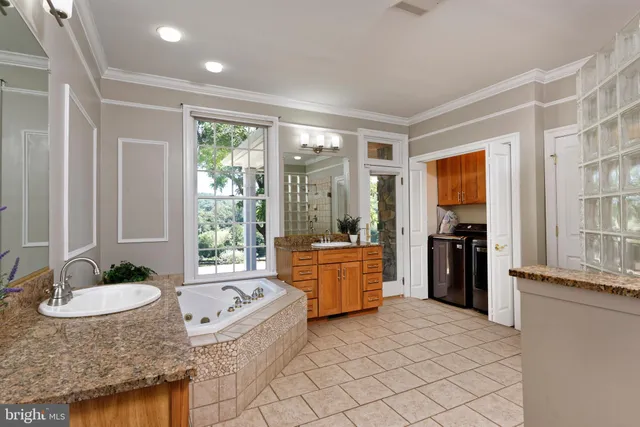 a room with furniture pool table and a rug