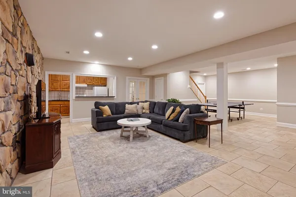 a view of a livingroom with furniture and furniture