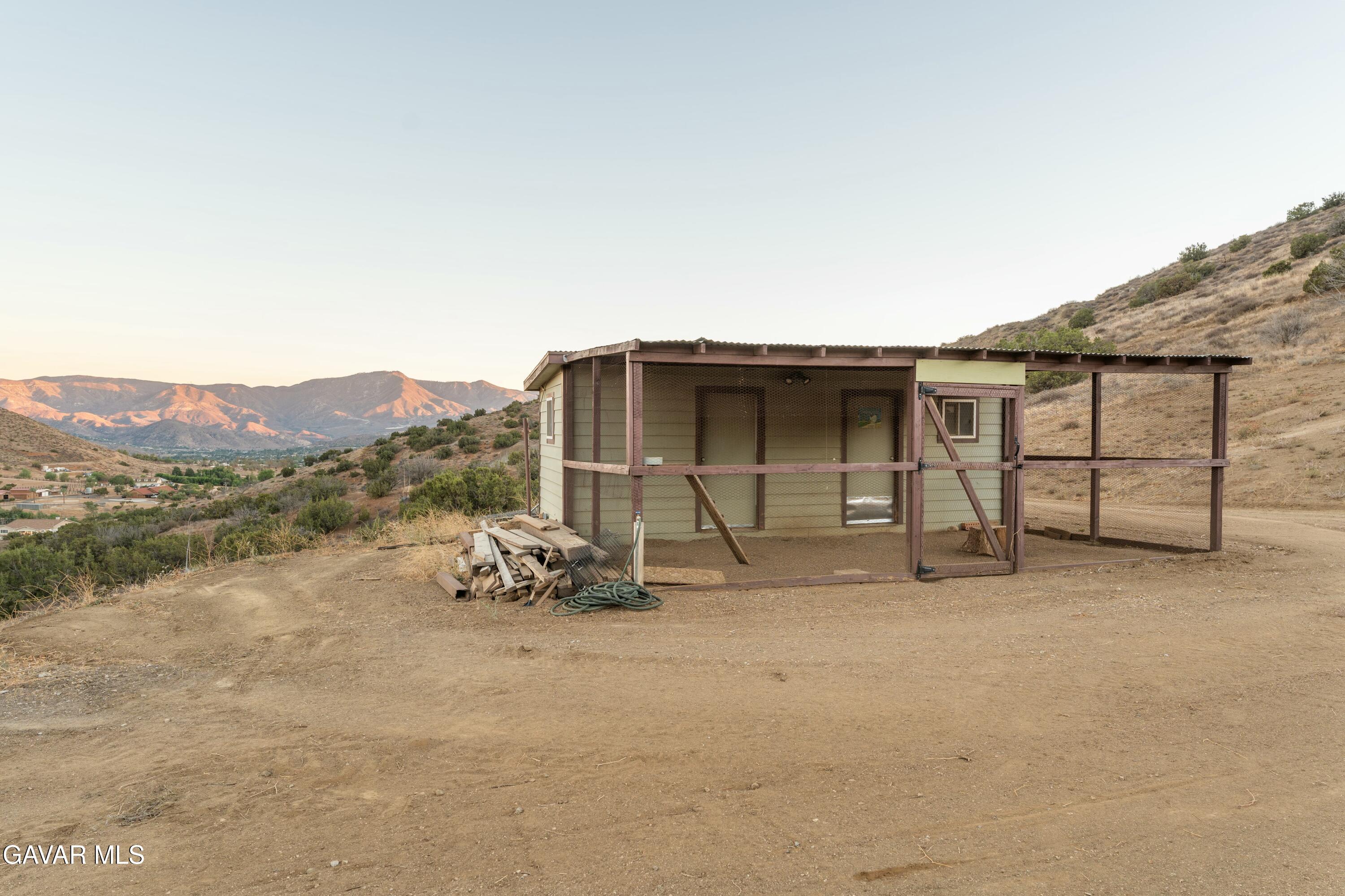 34625 Red Rover Mine Road Acton, CA 93510 - Photo 13 of 66 a view of a house with a yard and sitting area