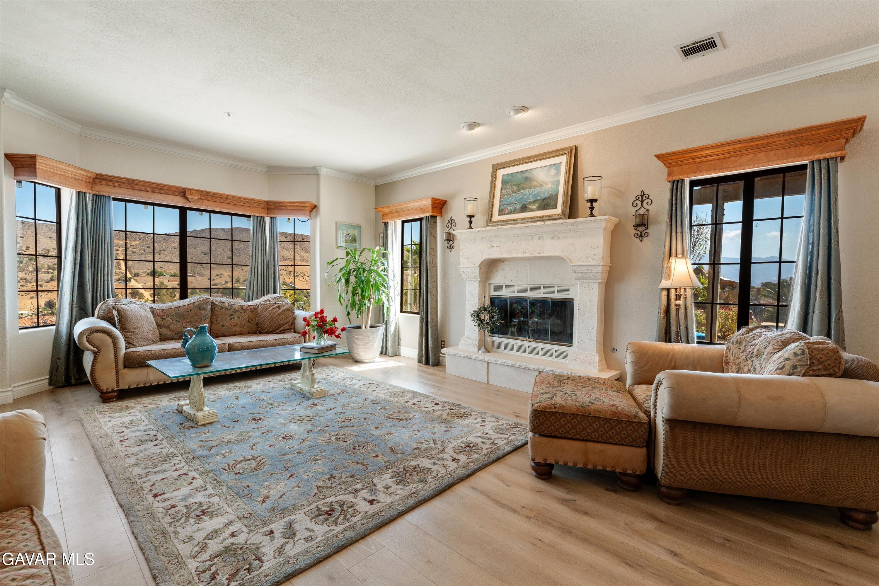 34625 Red Rover Mine Road Acton, CA 93510 - Photo 18 of 66 a living room with furniture and a fireplace
