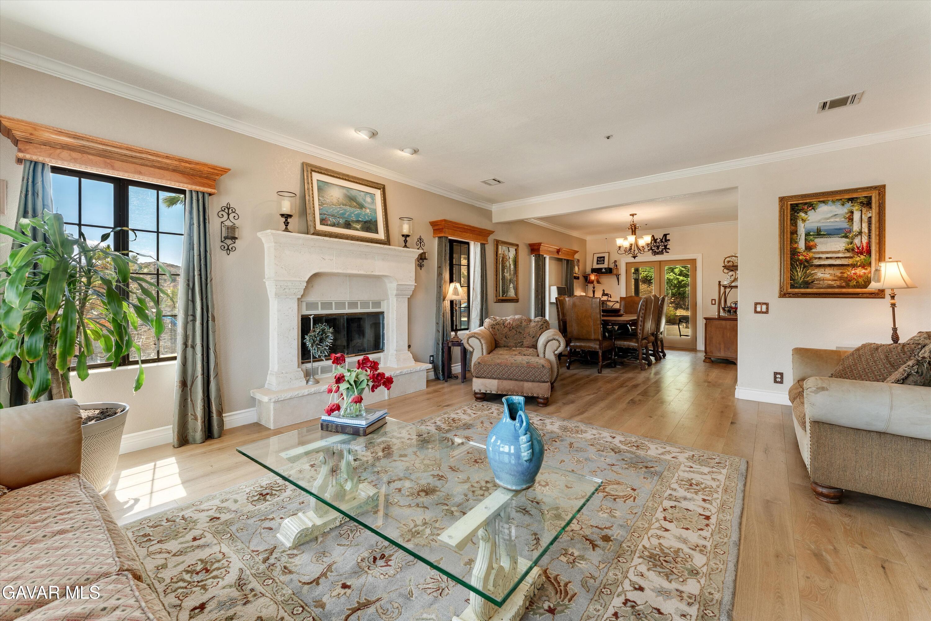 34625 Red Rover Mine Road Acton, CA 93510 - Photo 19 of 66 a living room with furniture fireplace and wooden floor