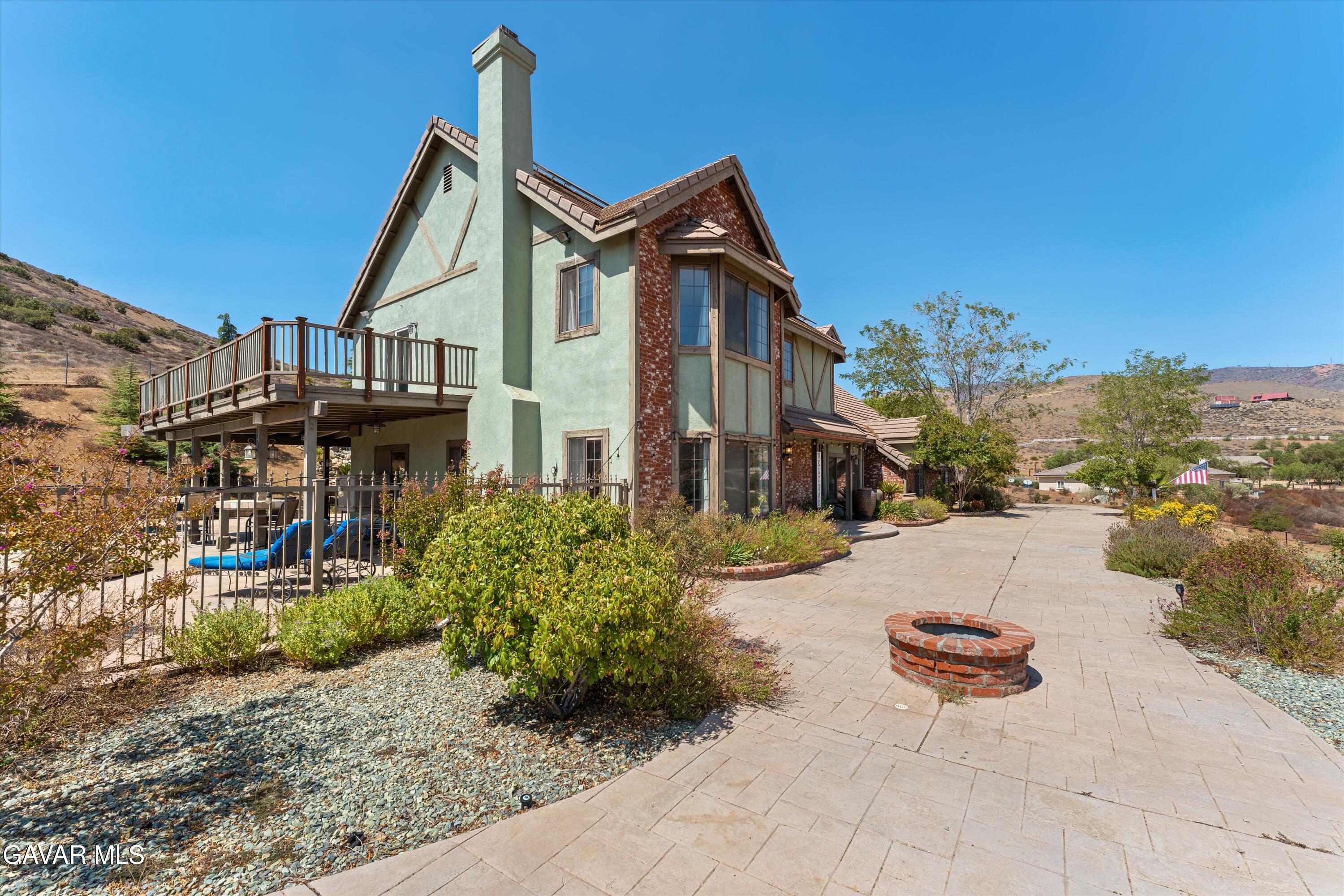 34625 Red Rover Mine Road Acton, CA 93510 - Photo 23 of 66 a view of a house with swimming pool