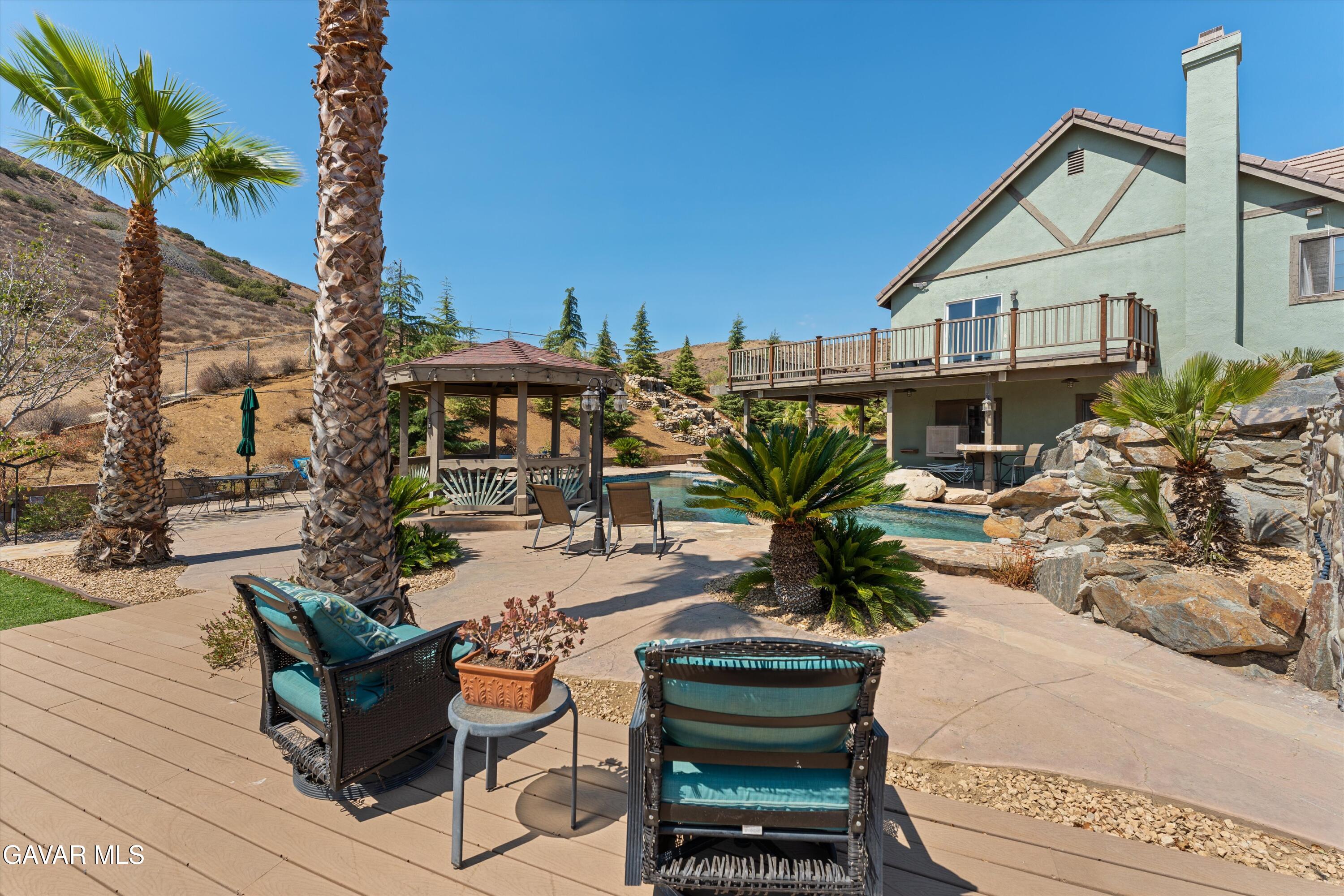34625 Red Rover Mine Road Acton, CA 93510 - Photo 30 of 66 a view of a chairs and table in patio