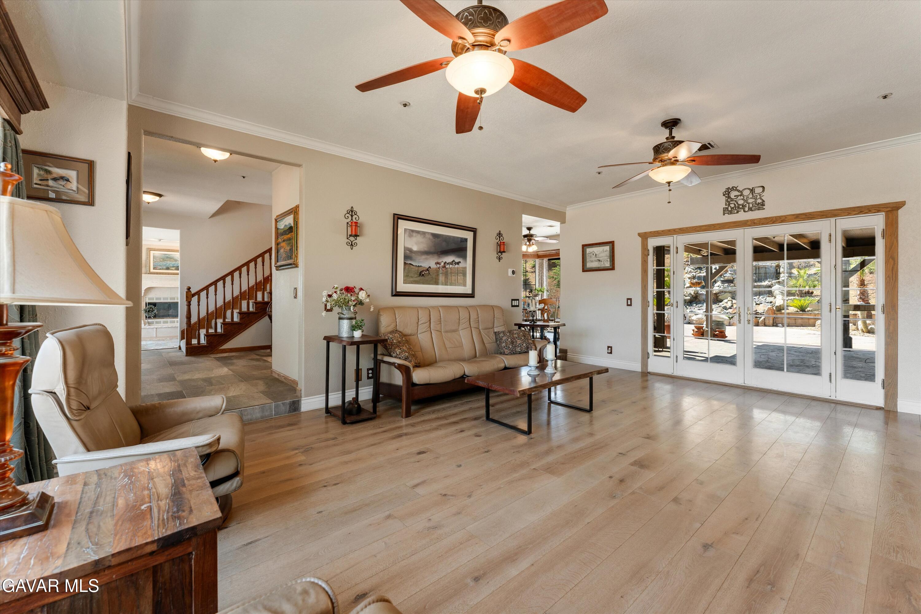 34625 Red Rover Mine Road Acton, CA 93510 - Photo 40 of 66 a living room with fireplace furniture and a wooden floor