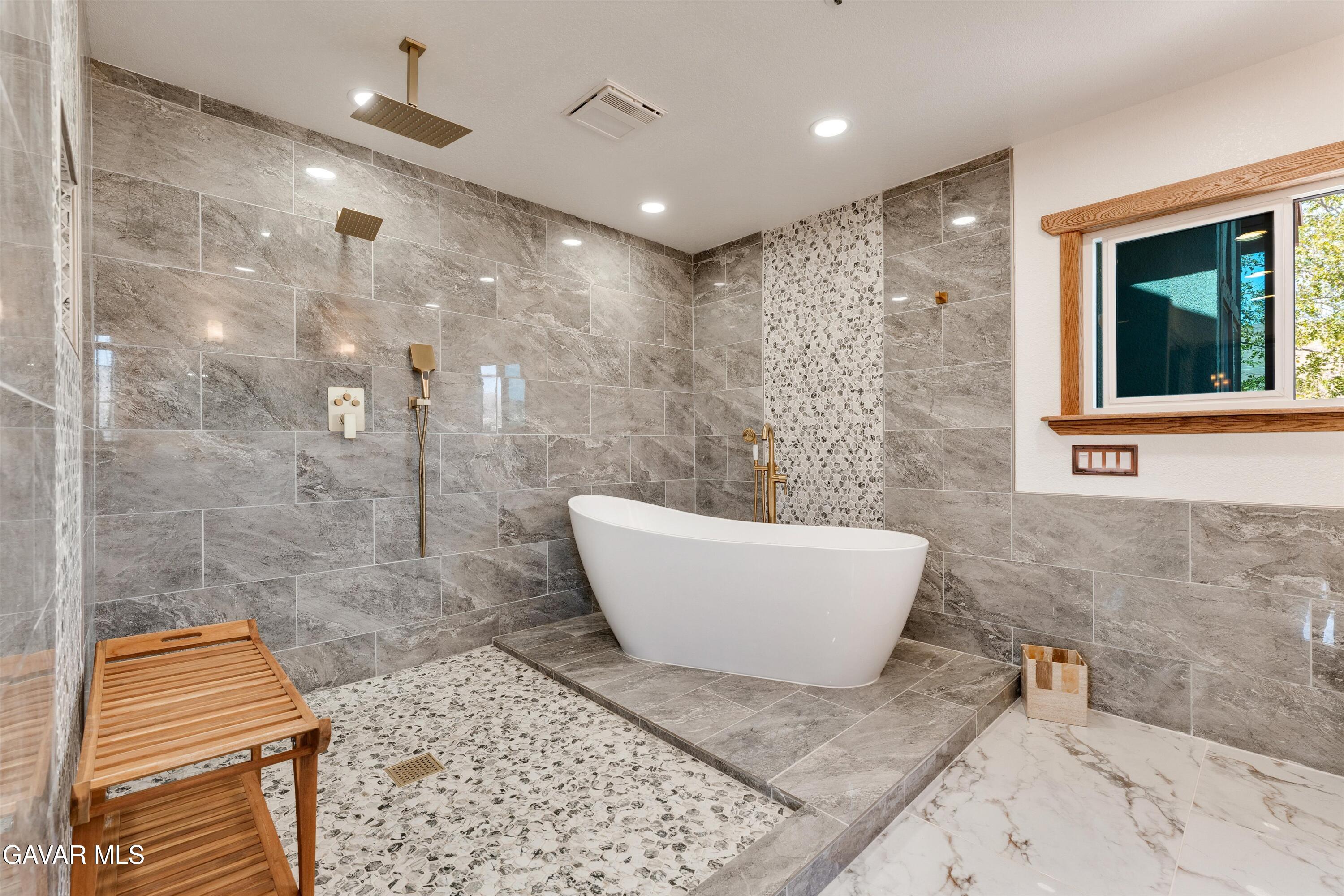 34625 Red Rover Mine Road Acton, CA 93510 - Photo 44 of 66 a bathroom with a bathtub and shower