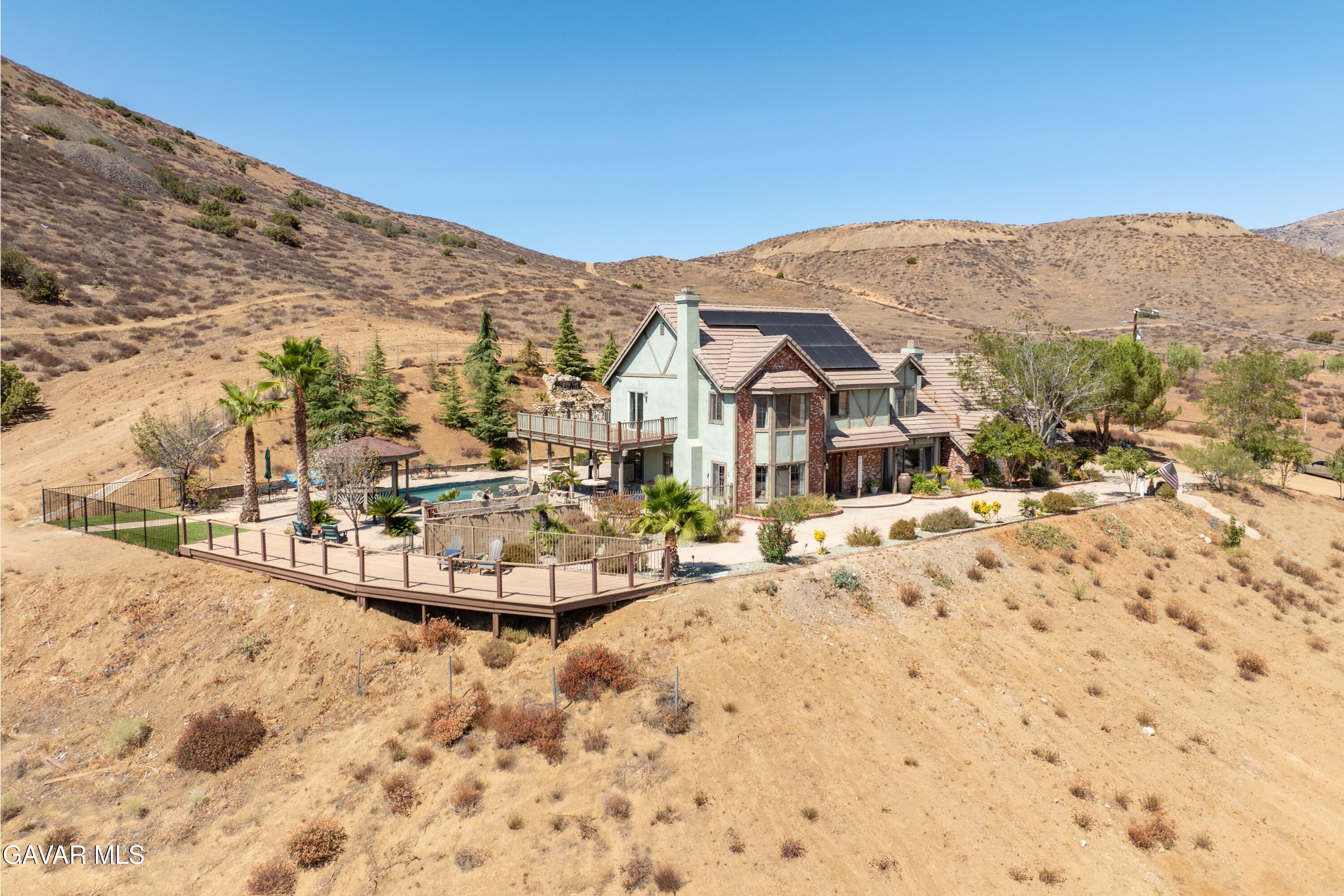 34625 Red Rover Mine Road Acton, CA 93510 - Photo 49 of 66 a view of a terrace with a snow in the background