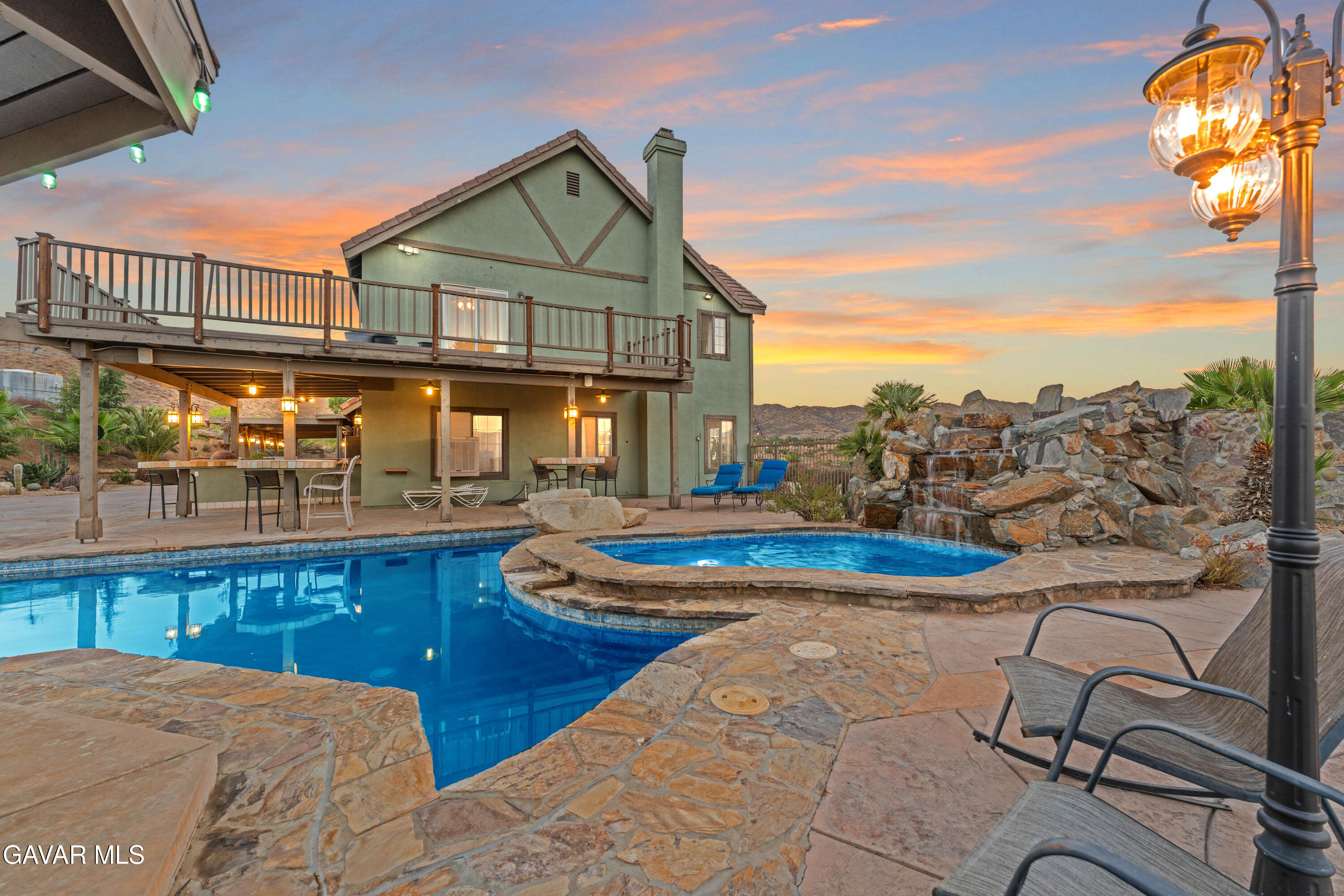 34625 Red Rover Mine Road Acton, CA 93510 - Photo 52 of 66 a view of a swimming pool with a lounge chair