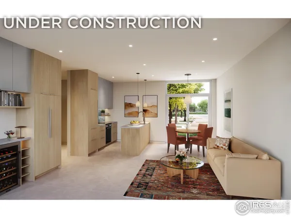 a living room with furniture a large window and stainless steel appliances