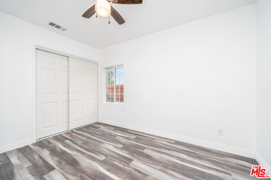 6860 Murray Street Riverside, CA 92504 - Photo 17 of 38 a view of empty room with ceiling fan
