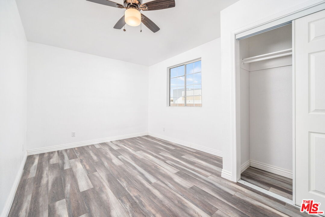 6860 Murray Street Riverside, CA 92504 - Photo 18 of 38 a view of empty room with wooden floor