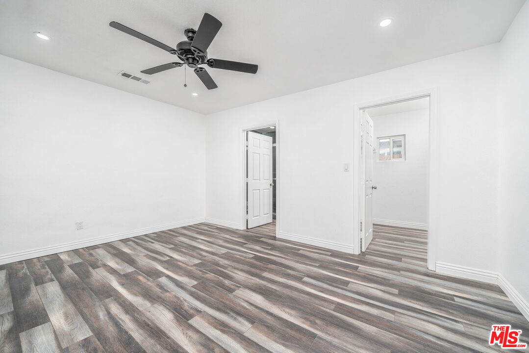 6860 Murray Street Riverside, CA 92504 - Photo 21 of 38 a view of a livingroom with a ceiling fan