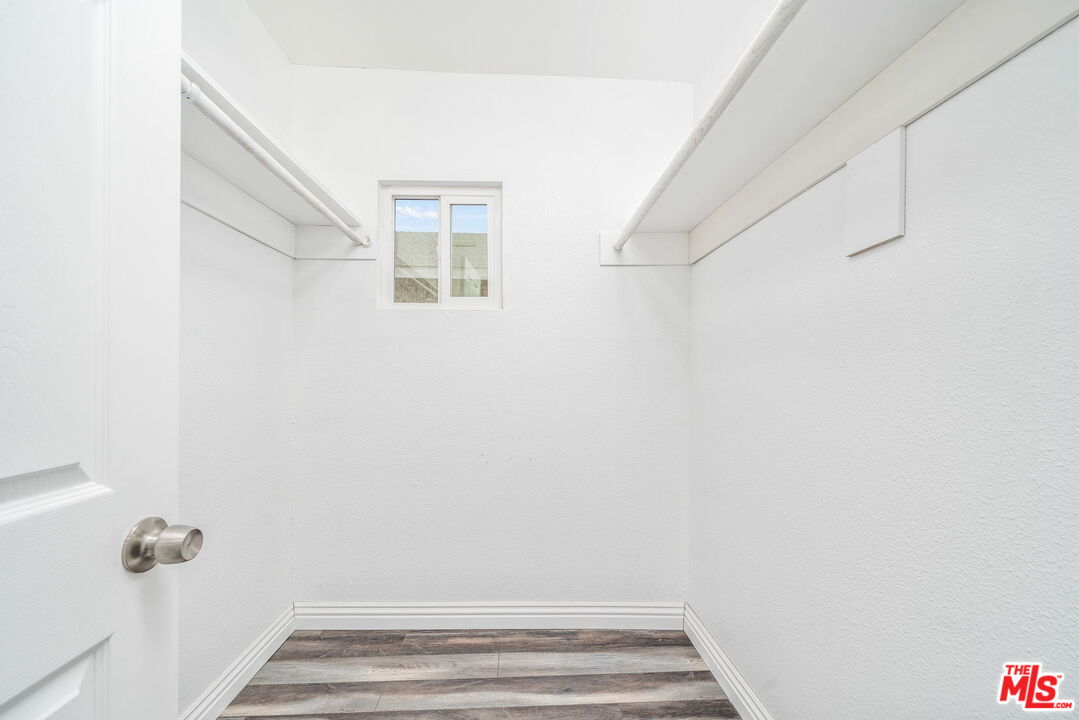 6860 Murray Street Riverside, CA 92504 - Photo 24 of 38 a view of small space with racks on the wall