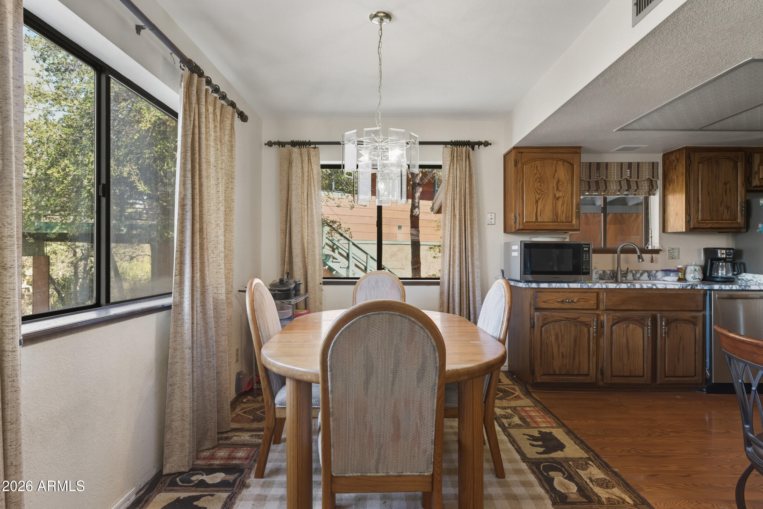 607 East Drowsey Circle Payson, AZ 85541 - Photo 11 of 33 a view of a dining room with furniture window and outside view
