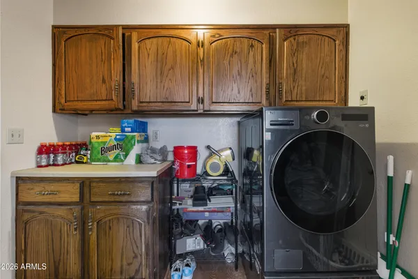 a utility room with dryer and washer