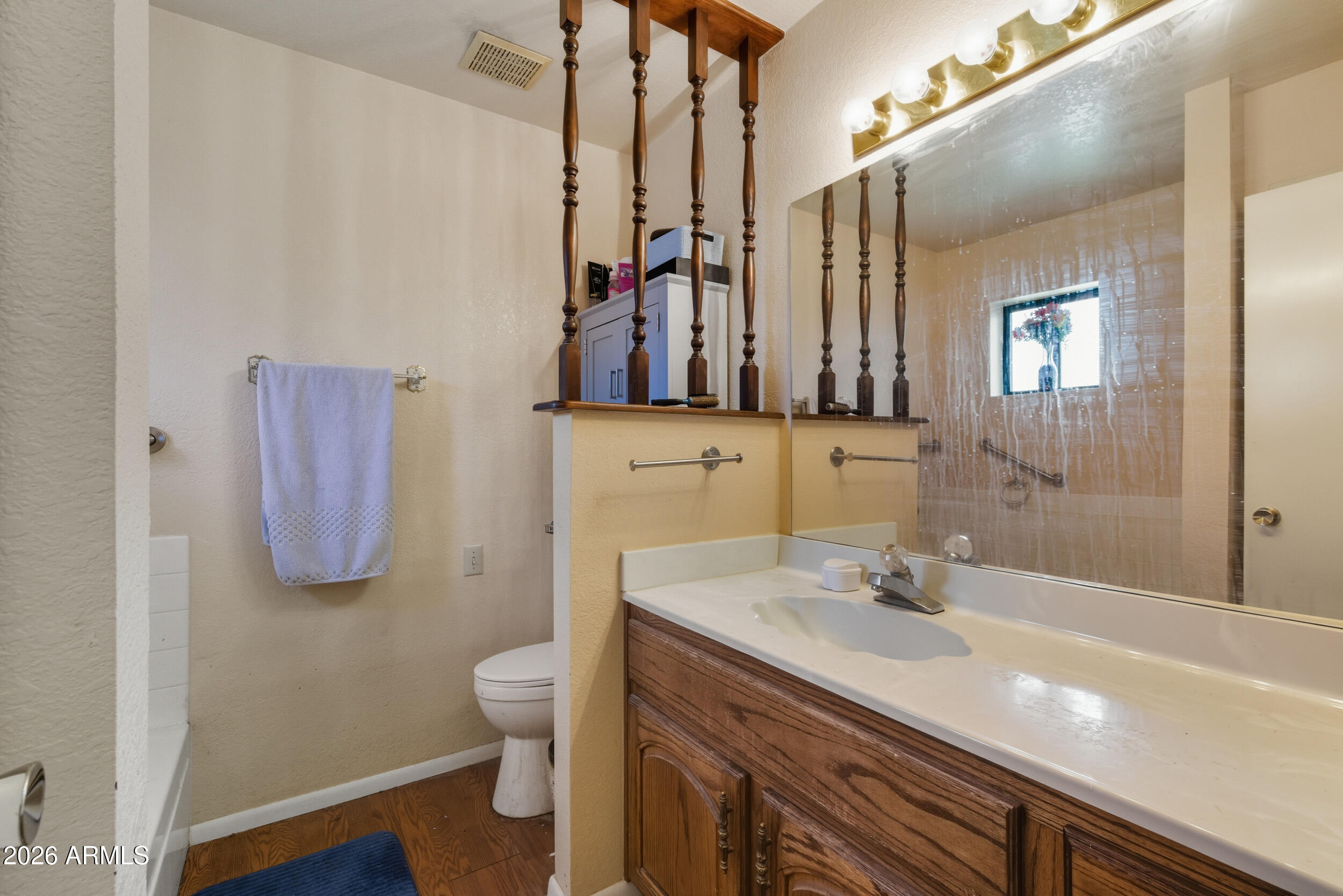 607 East Drowsey Circle Payson, AZ 85541 - Photo 25 of 33 a bathroom with a sink a toilet and shower