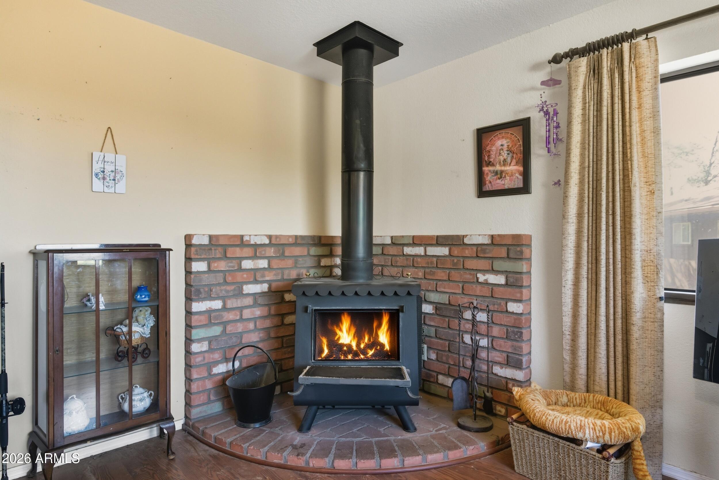 607 East Drowsey Circle Payson, AZ 85541 - Photo 9 of 33 a living room with fireplace furniture and a fireplace