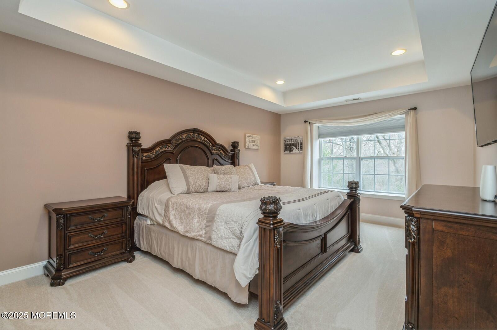 33 Brookfield Drive Jackson, NJ 08527 - Photo 12 of 23 a bedroom with a bed and a window