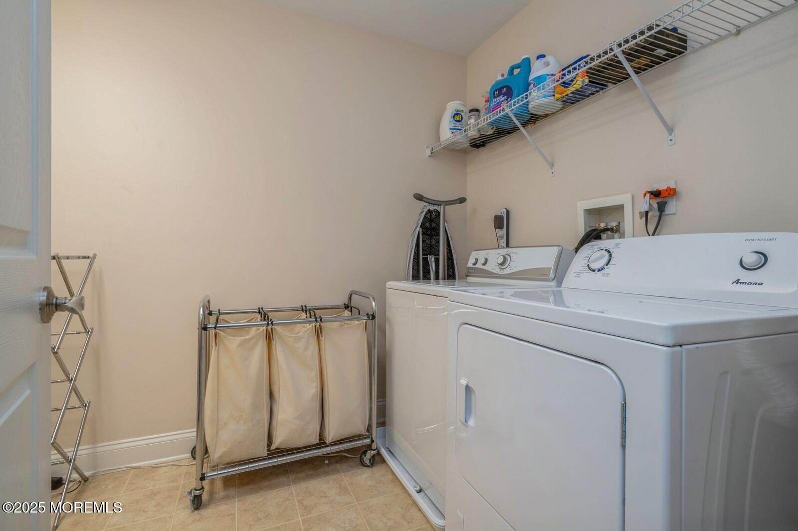 33 Brookfield Drive Jackson, NJ 08527 - Photo 20 of 23 a utility room with dryer and washer