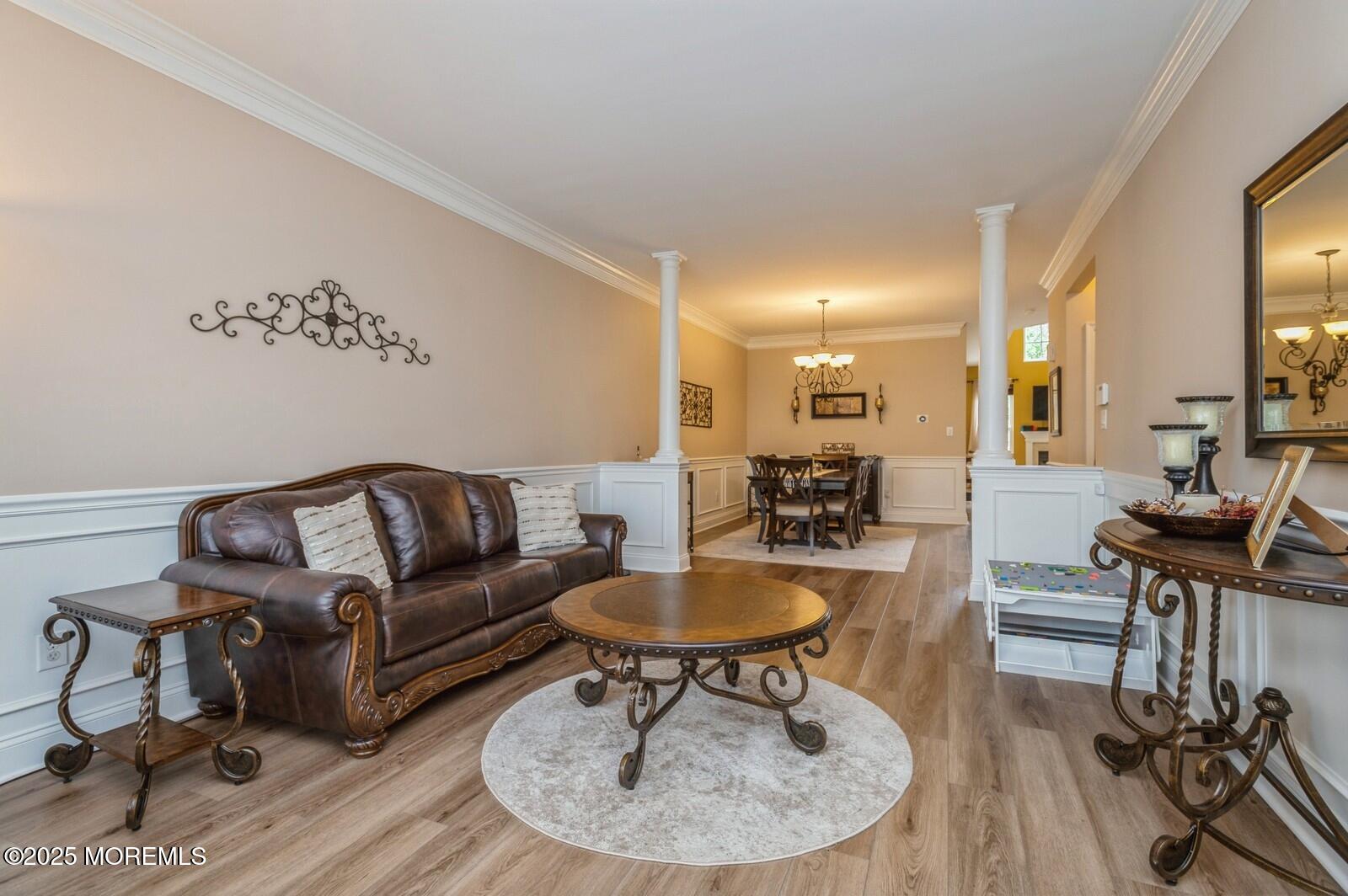33 Brookfield Drive Jackson, NJ 08527 - Photo 3 of 23 a living room with furniture a dining table and a stove